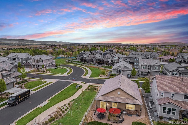 3480 Mount Powell Dr, Broomfield, CO 80023 - aerial view at dusk featuring a mountain view and a residential view