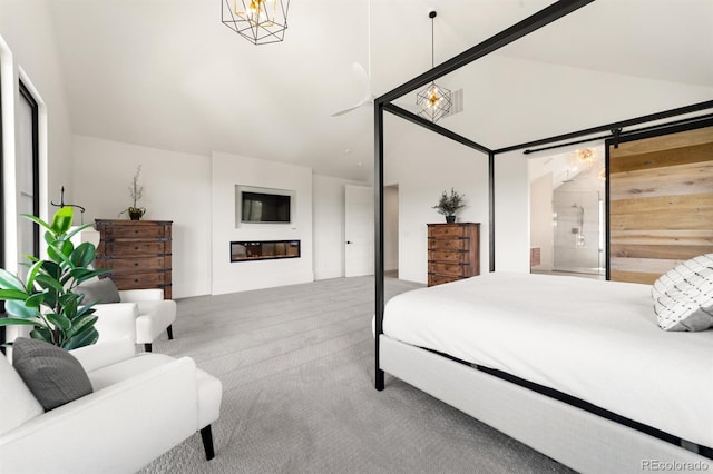 carpeted bedroom with a towering ceiling and an inviting chandelier