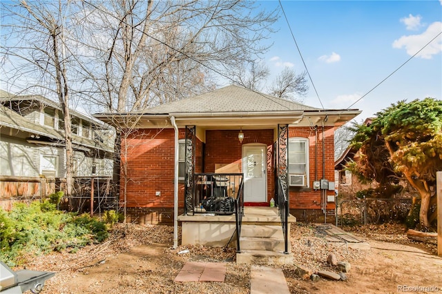 back of house with covered porch