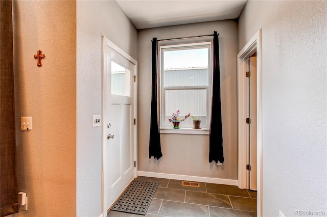 262 S 4th Ct, Deer Trail, CO 80105 - corridor featuring tile patterned flooring and baseboards