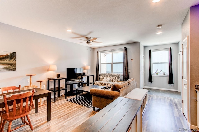 262 S 4th Ct, Deer Trail, CO 80105 - living area featuring wood finished floors, a ceiling fan, and recessed lighting