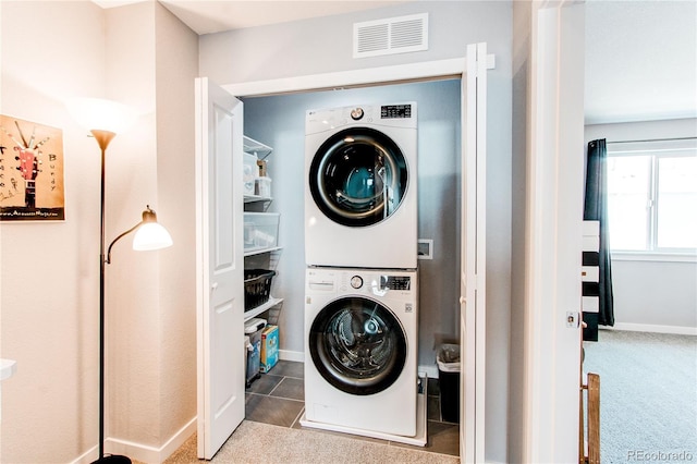 262 S 4th Ct, Deer Trail, CO 80105 - laundry room with stacked washer / dryer and carpet