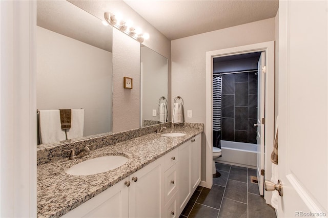 262 S 4th Ct, Deer Trail, CO 80105 - bathroom featuring double vanity, tile patterned flooring, and shower / bath combo