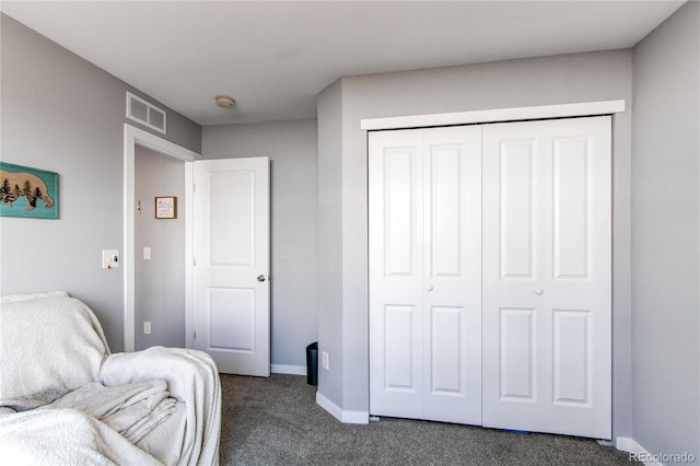 262 S 4th Ct, Deer Trail, CO 80105 - bedroom featuring dark colored carpet and a closet