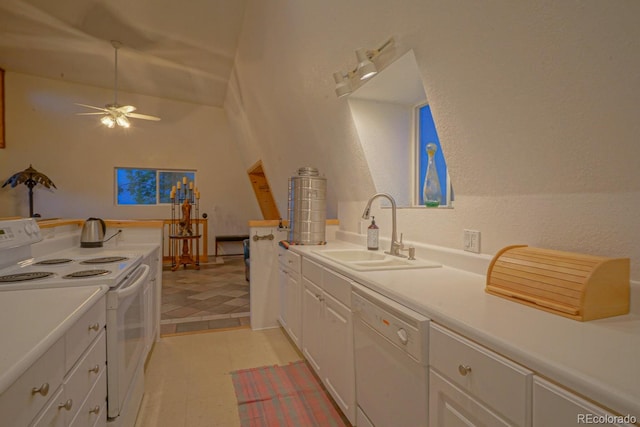 kitchen with white cabinetry, white appliances, sink, ceiling fan, and light tile floors