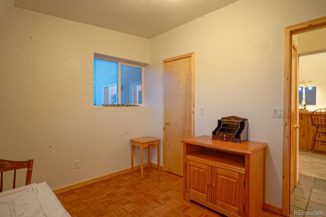 bedroom featuring light parquet floors