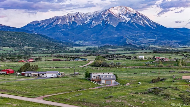 view of mountain feature with a rural view