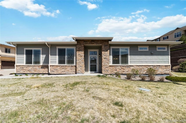 12278 Stone Timber Ct, Parker, CO 80134 - prairie-style house featuring stone siding and a front yard