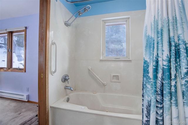 bathroom featuring shower / bath combo with shower curtain and baseboard heating