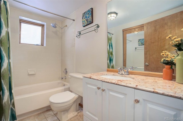 full bathroom featuring vanity, tile patterned floors, shower / bath combo with shower curtain, and toilet