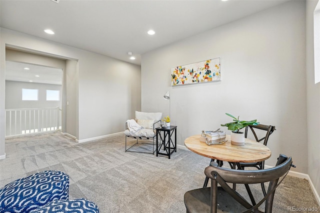 living area featuring carpet flooring, baseboards, and recessed lighting