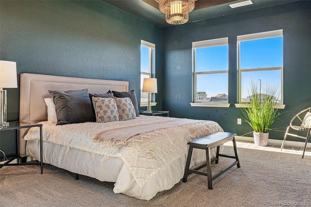 bedroom featuring visible vents and carpet