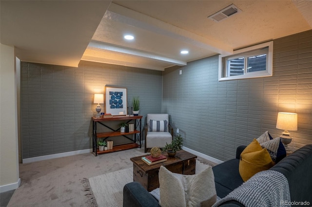 living area featuring recessed lighting, visible vents, baseboards, beam ceiling, and carpet