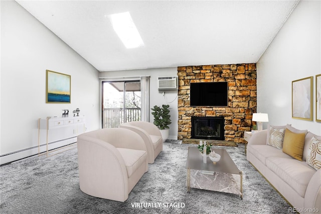 381 S Ames St Unit E305, Lakewood, CO 80226 - carpeted living area featuring baseboard heating, an AC wall unit, lofted ceiling, and a fireplace