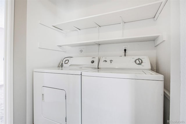 381 S Ames St Unit E305, Lakewood, CO 80226 - laundry room with washing machine and clothes dryer and laundry area