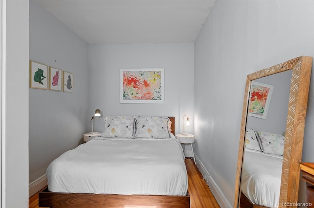 bedroom featuring light wood-type flooring