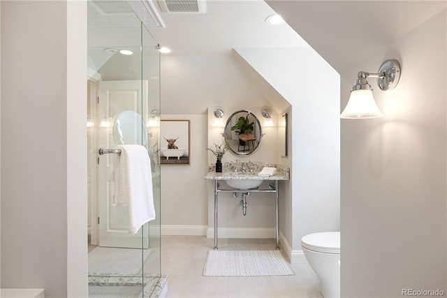 bathroom with tile patterned floors, a stall shower, toilet, baseboards, and visible vents
