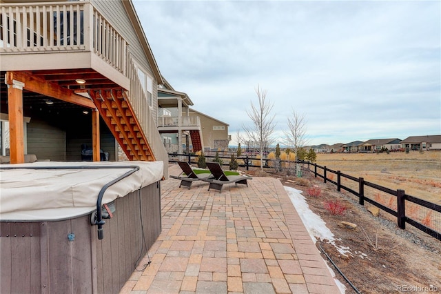 view of patio / terrace featuring a hot tub