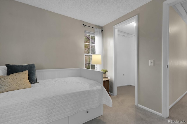 2021 S Hannibal Way Unit F, Aurora, CO 80013 - bedroom with light colored carpet and a textured ceiling