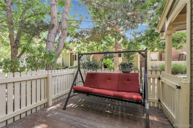 2021 S Hannibal Way Unit F, Aurora, CO 80013 - wooden deck with an outdoor hangout area and a gate