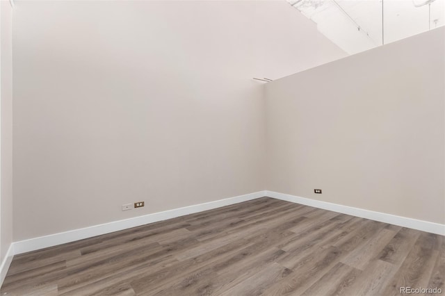 720 16th St Unit 207, Denver, CO 80202 - empty room featuring wood finished floors and baseboards