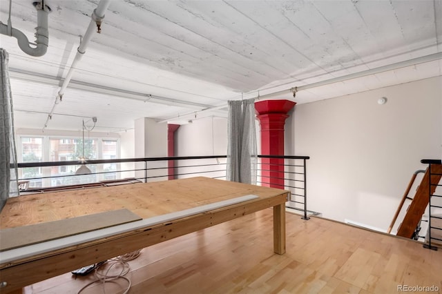 720 16th St Unit 207, Denver, CO 80202 - hall with wood finished floors and track lighting