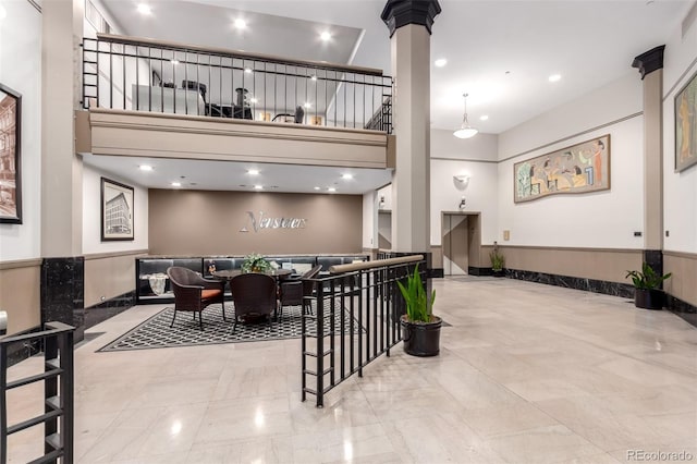 720 16th St Unit 207, Denver, CO 80202 - common area with a high ceiling, wainscoting, and recessed lighting