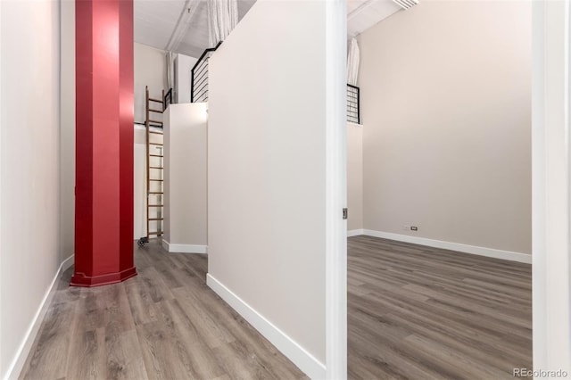 720 16th St Unit 207, Denver, CO 80202 - corridor with wood finished floors and baseboards