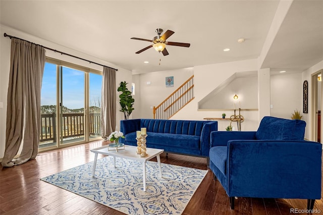 living room with ceiling fan, recessed lighting, wood finished floors, and stairs