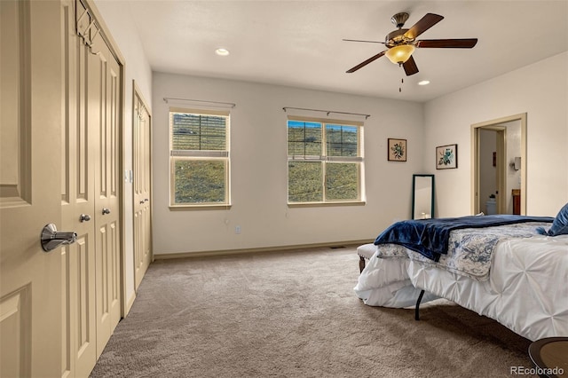 bedroom with light carpet, baseboards, a ceiling fan, and recessed lighting