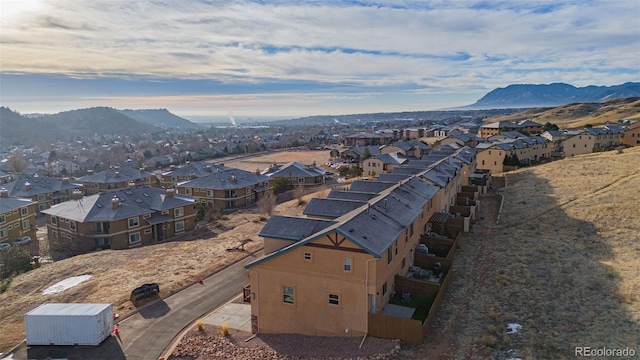 birds eye view of property with a residential view and a mountain view