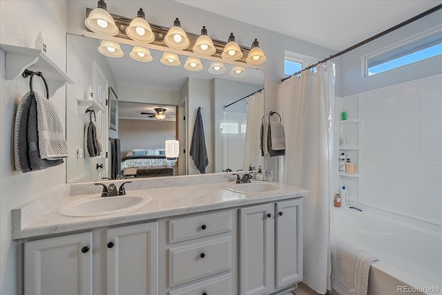 bathroom featuring vanity, ceiling fan, and shower / bath combo