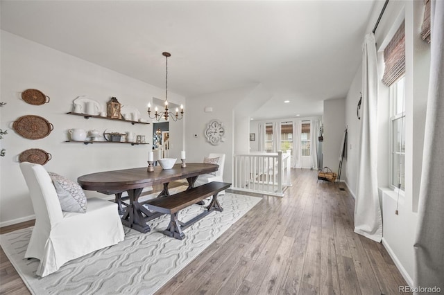 3535 Raintree Ln, Dacono, CO 80514 - dining room featuring hardwood / wood-style floors, a chandelier, and recessed lighting