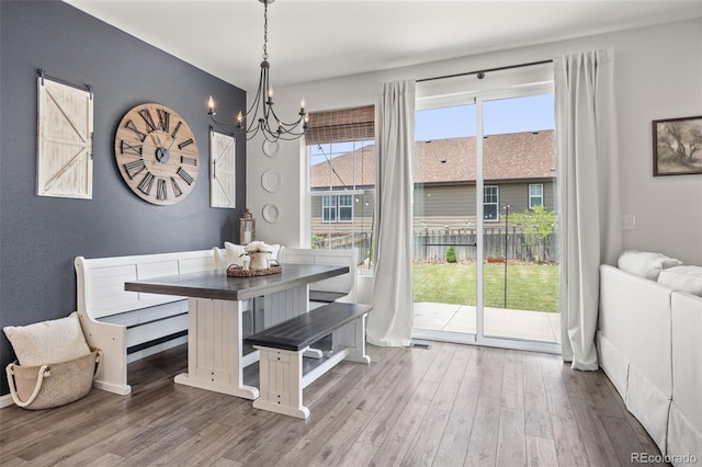 3535 Raintree Ln, Dacono, CO 80514 - dining area with a chandelier and wood finished floors