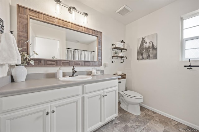 3535 Raintree Ln, Dacono, CO 80514 - bathroom with vanity and toilet