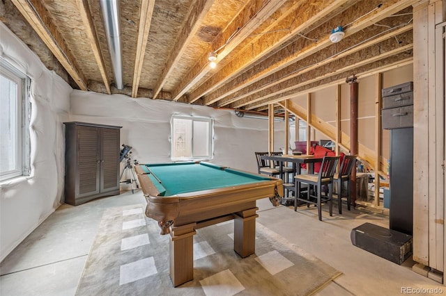 3535 Raintree Ln, Dacono, CO 80514 - playroom with pool table and concrete flooring