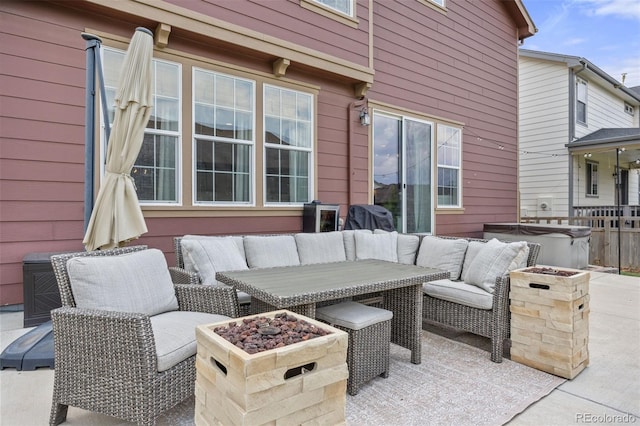 3535 Raintree Ln, Dacono, CO 80514 - view of patio / terrace with an outdoor living space with a fire pit