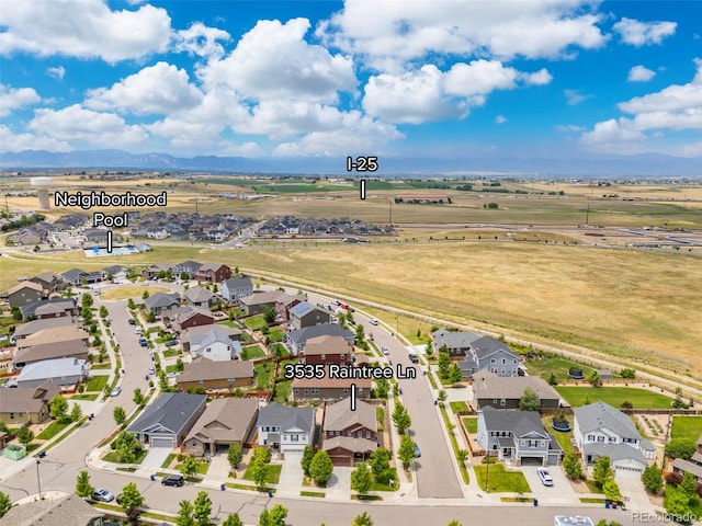 3535 Raintree Ln, Dacono, CO 80514 - aerial view of residential area with mountains