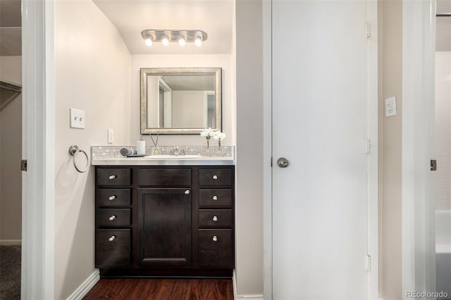 5300 E Cherry Creek S Drive 324, Denver, CO 80246 - bathroom with vanity and wood finished floors