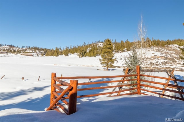 view of snow covered deck