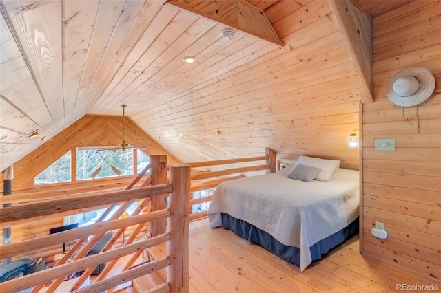 bedroom with vaulted ceiling, light wood finished floors, and wooden ceiling