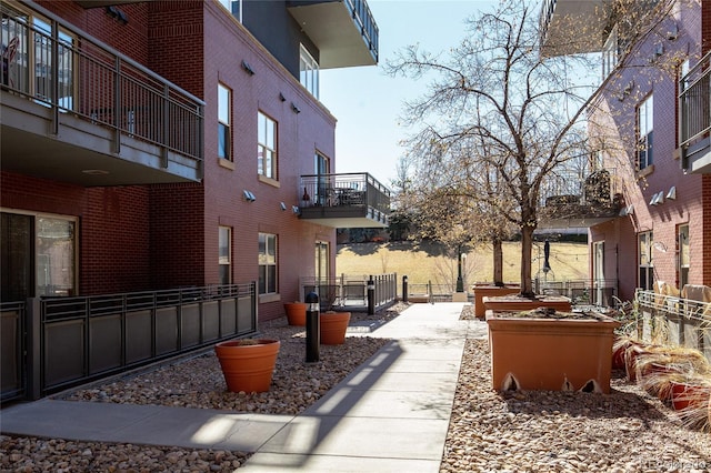 view of community with fence