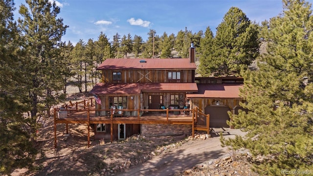 96 County Road 7, Fairplay, CO 80440 - back of property with a deck and a chimney