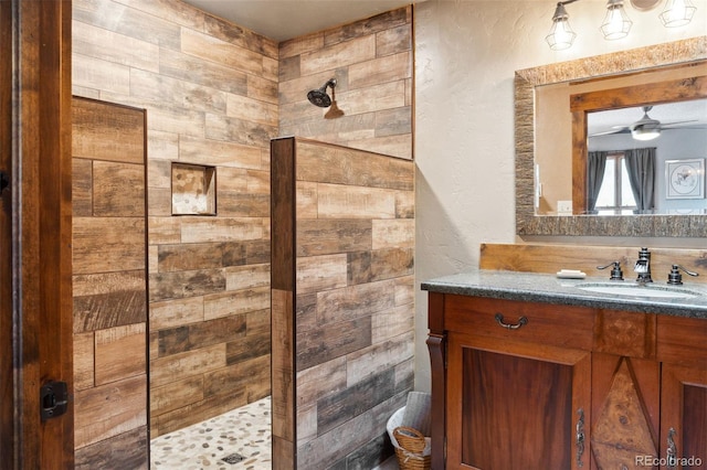 96 County Road 7, Fairplay, CO 80440 - full bath featuring vanity, a textured wall, walk in shower, and ceiling fan