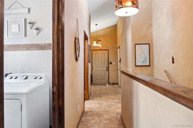 96 County Road 7, Fairplay, CO 80440 - hallway featuring baseboards, stone finish flooring, and washer / clothes dryer