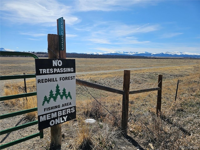 96 County Road 7, Fairplay, CO 80440 - details with fence and a mountain view