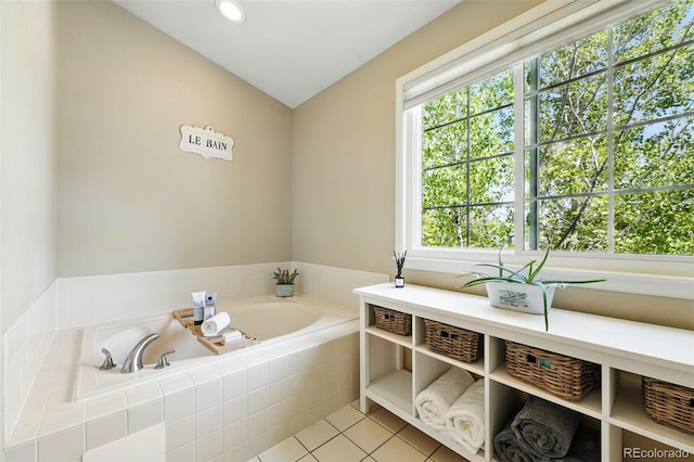 bathroom featuring tile patterned floors, recessed lighting, and a bath