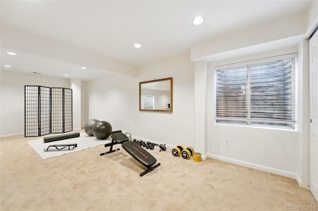 exercise room with baseboards, carpet flooring, and recessed lighting