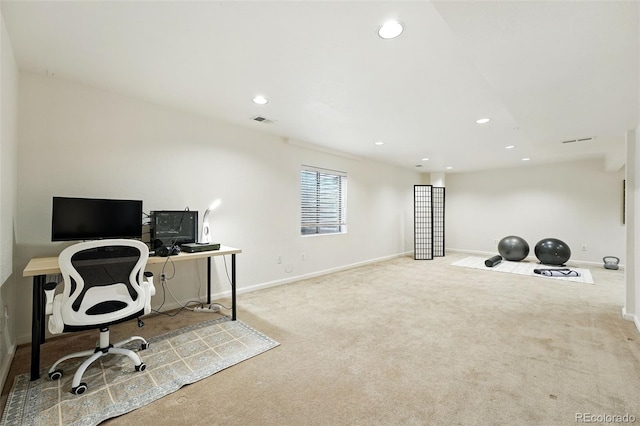 carpeted office space with baseboards, recessed lighting, and visible vents