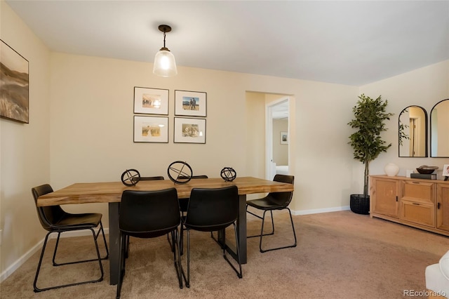 2964 S Akron St, Denver, CO 80231 - dining space featuring baseboards and light colored carpet
